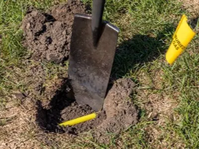 Shovel digging near gas line