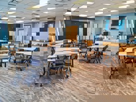 boardroom with tables and chairs