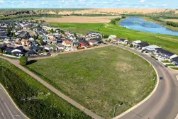 alt="Aerial view of 48 Ranchlands Boulevard NE"