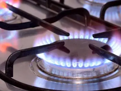 Closeup of a natural gas burner on a stove