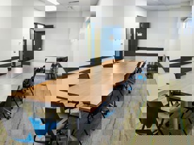 boardroom with tables and chairs