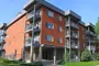 alt="An infill multi-unit building"