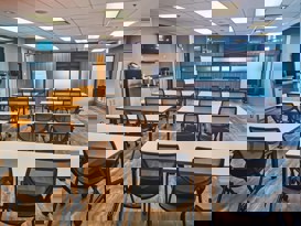 boardroom with tables and chairs